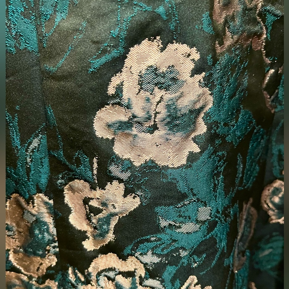 Silk gorgeous, tailored perfectly. Great for the holidays. Elegant